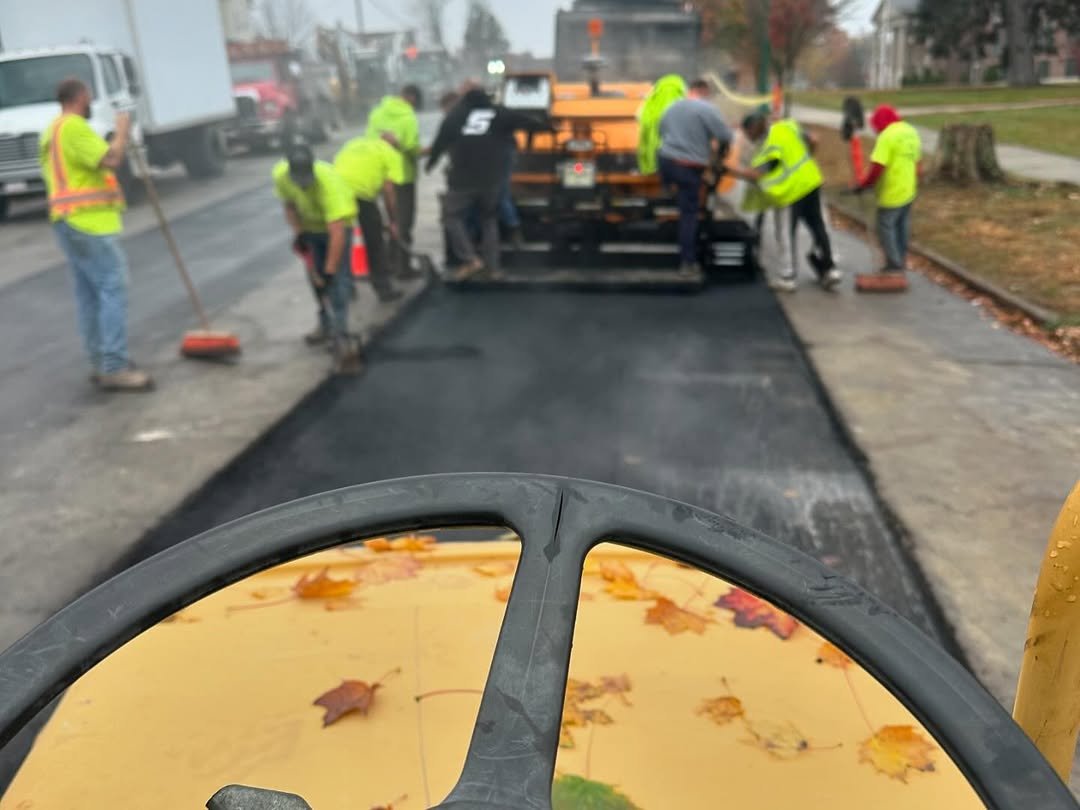 Sasso paving crew installing asphalt