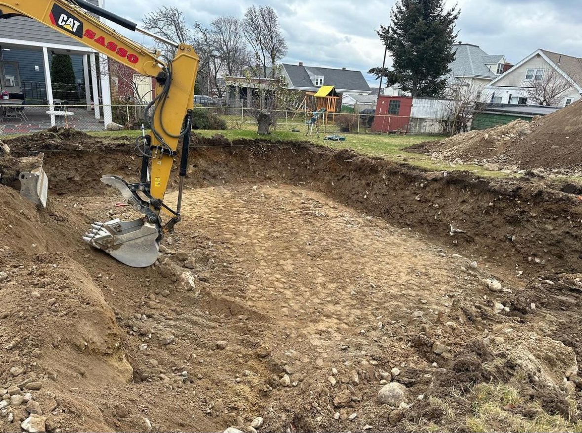 Sasso excavator preparing a residential site